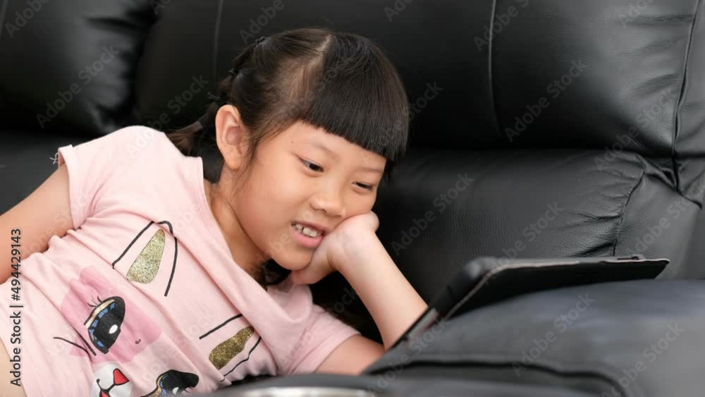 kid watching tablet, child addicted cartoon
