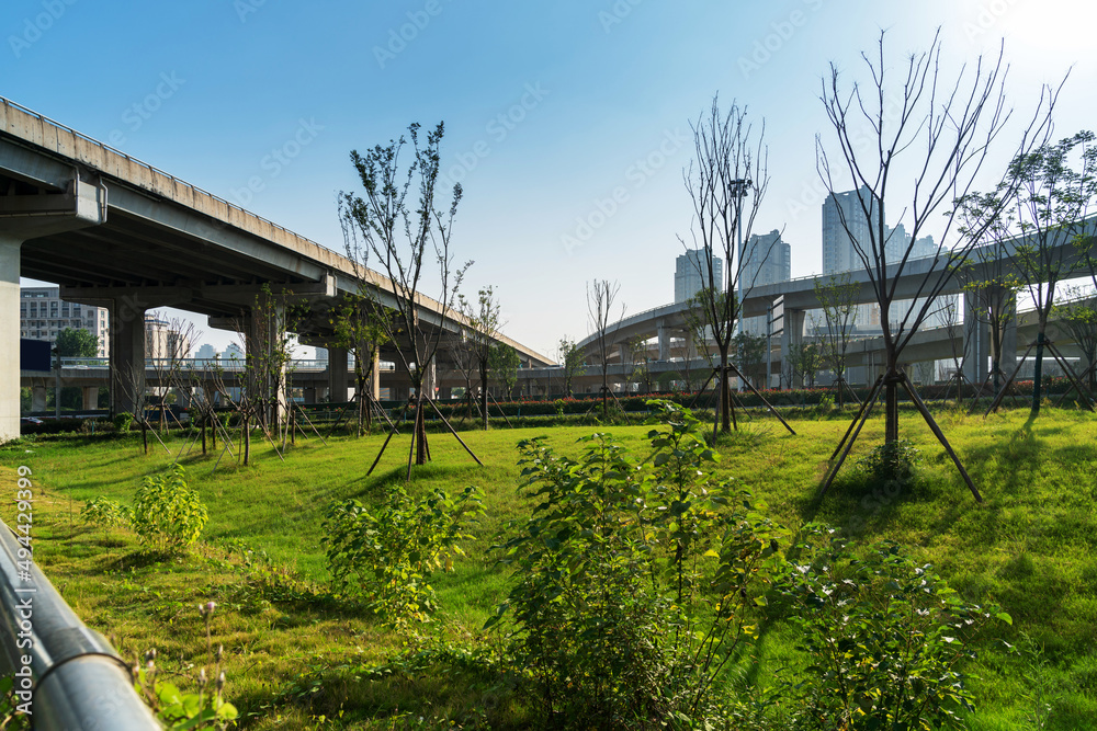 Concrete structure and asphalt road space under the overpass in the city Concrete structure and asphalt road space under the overpass in the city