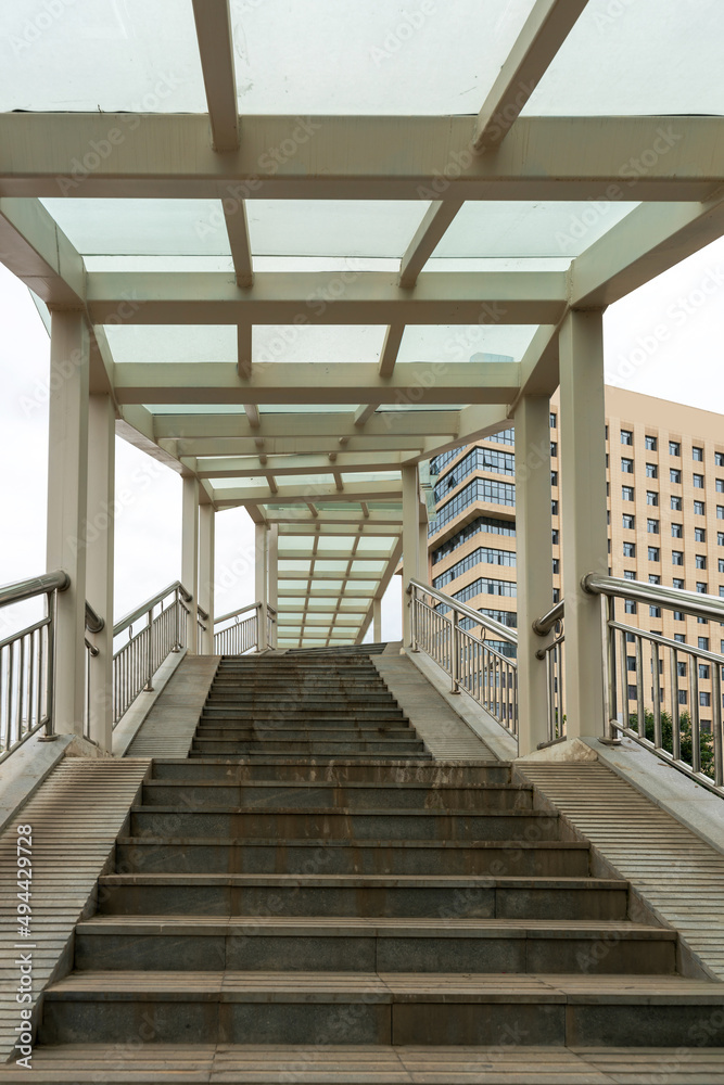 Flight of Stairs to a Modern Pedestrian Bridge Flight of Stairs to a Modern Pedestrian Bridge