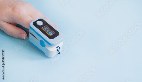 Measurement of the oxygen level in the blood. The finger is inserted into the pulse oximeter.