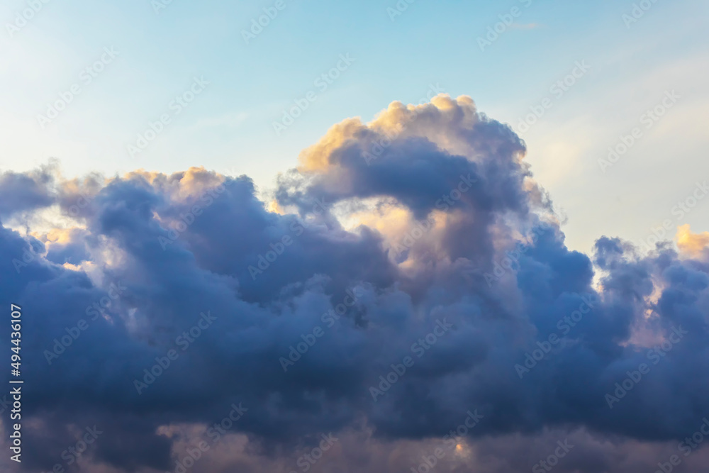 Beautiful clouds illuminated by the sun at sunset Beautiful clouds illuminated by the sun at sunset
