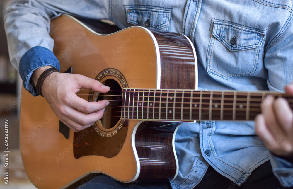 Fototapeta premium man playing guitar