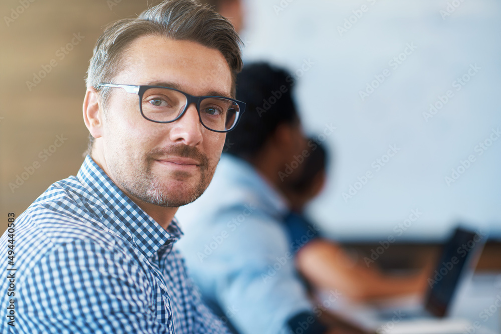 He always brings his A-game to work. Cropped portrait of a mature businessman in an office. He always brings his A-game to work. Cropped portrait of a mature businessman in an office.