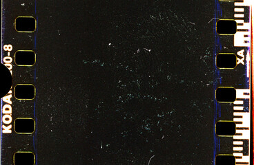 grunge Kodak Gold film strip from an old 35mm colorfilm with space for text with grain and texture