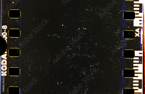 grunge Kodak Gold film strip from an old 35mm colorfilm with space for text with grain and texture