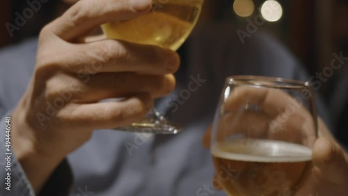 Friends celebrating with craft beer in a restaurant