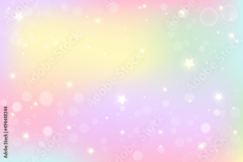 Rainbow fantasy background. Holographic illustration in pastel colors. Multicolored sky with stars and bokeh.