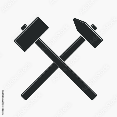 Fotografia, Obraz Two crossed hammers graphic sign