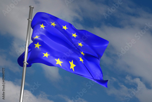 European Union flag waving in the wind on blue sky background. EU flag on flagpole. 3D render illustration.