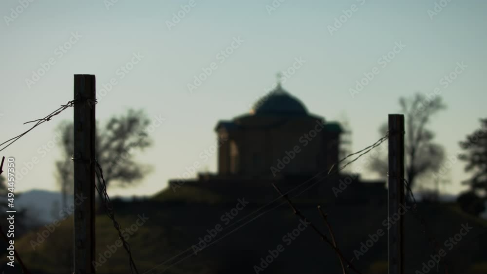 Grabkapelle on the Württemberg fokus pull to grapevines. Sunny spring day in the evening with sunset. With construction site on the right side. Stuttgart, Germany