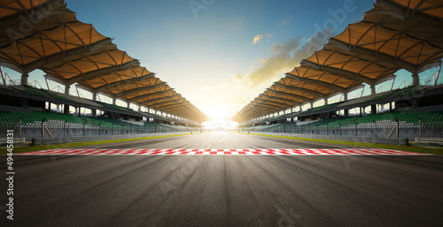 Evening scene asphalt international race track with starting or end line. 3D Rendering © Image Craft