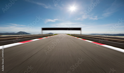 straight motion blurred race track. © Image Craft