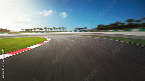 Curvy motion blurred race track. © Image Craft
