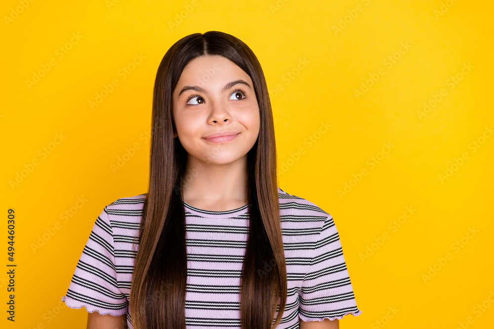 Photo of young pretty lady wonder look empty space imagination idea isolated over yellow color background Photo of young pretty lady wonder look empty space imagination idea isolated over yellow color background