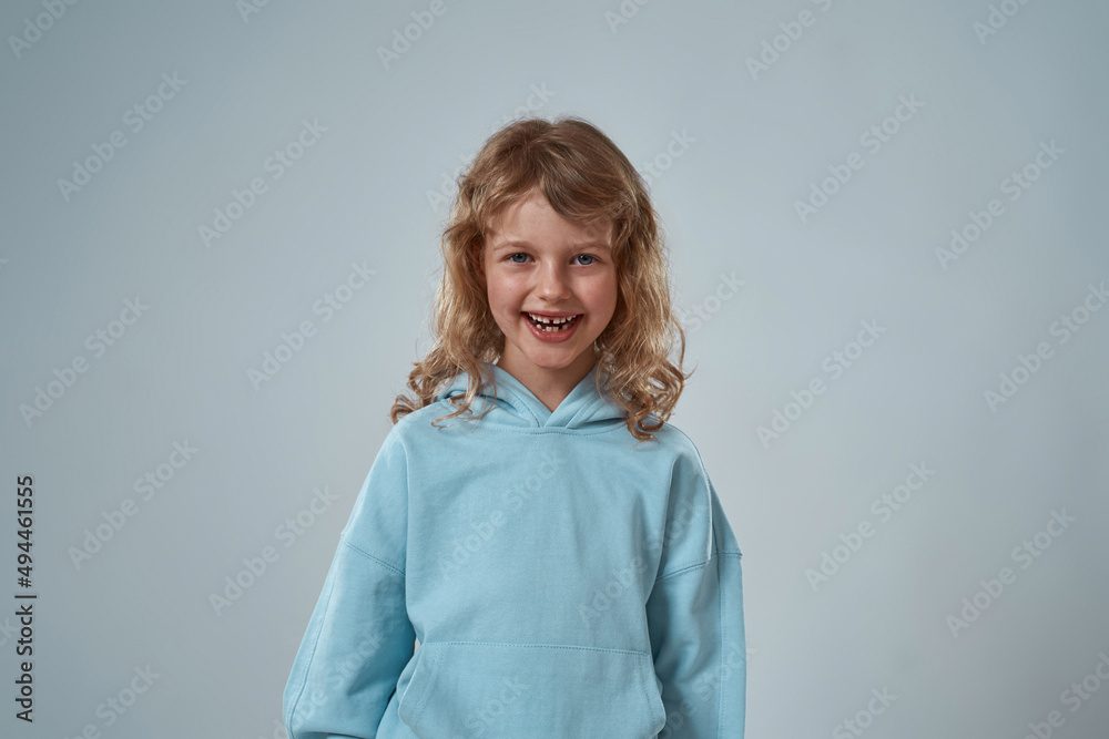 Cheerful caucasian little girl looking at camera Cheerful caucasian little girl looking at camera