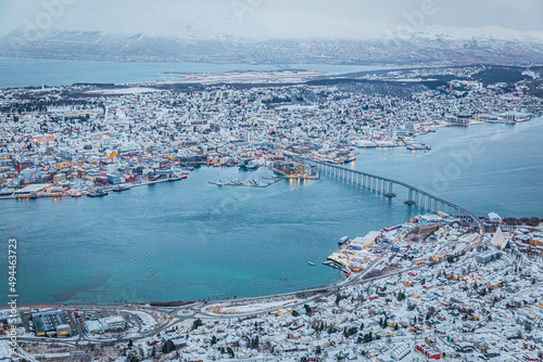 Aerial view of beautiful winter landscape of snow covered town Tromso photo