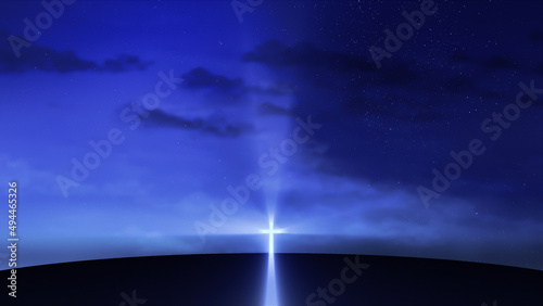 Bright cross on the hill with clouds moving on the starry sky