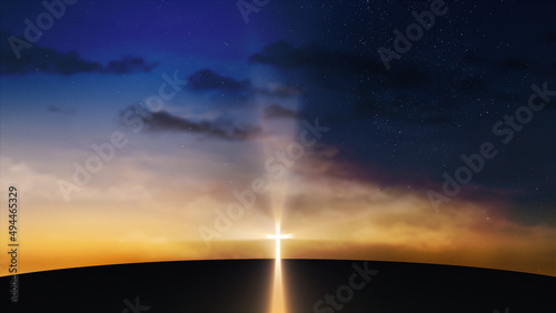 Bright cross on the hill with clouds moving on the starry sky
