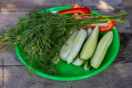 Ripe vegetables - paprika, cucumbers, dill. Useful plant foods, vitamins, fiber, antioxidants.