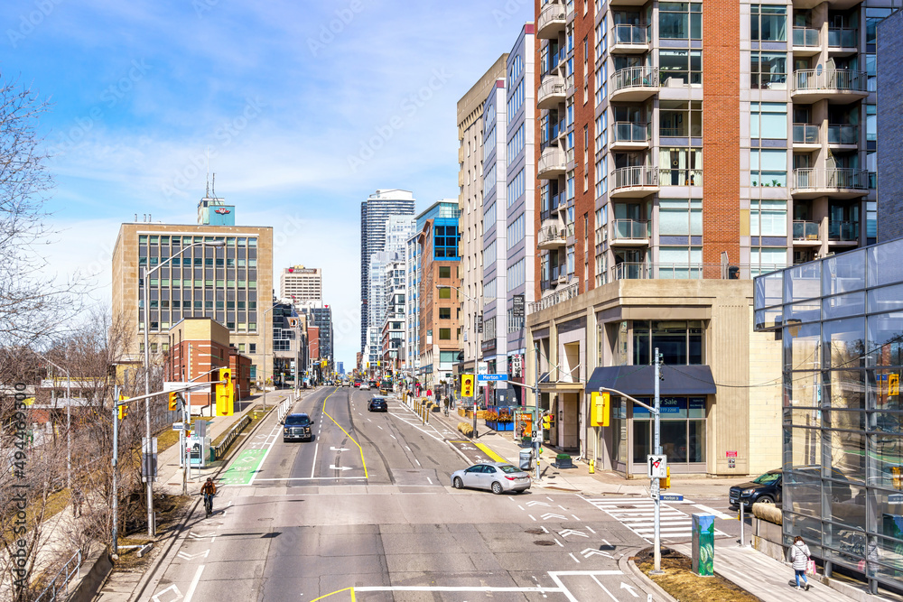Obraz premium Yonge St. at the height of the city midtown in Toronto, Canada. City skyline looking North. 
