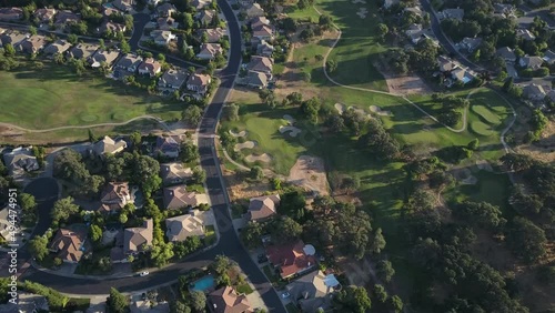 Aerial View of large residential neighborhood and golf course photo