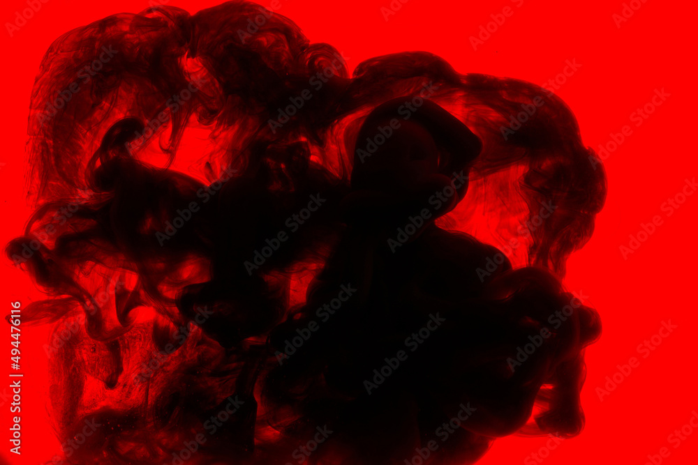 Black and red ink background, colorful fog, abstract swirling ocean, acrylic paint pigment underwater, dark smoke Black and red ink background, colorful fog, abstract swirling ocean, acrylic paint pigment underwater, dark smoke