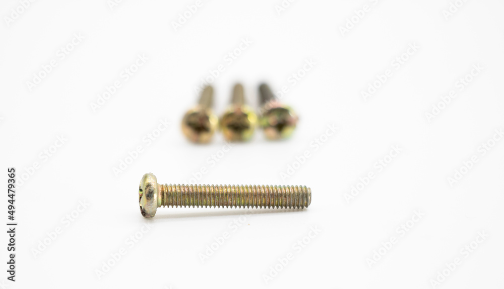 Close-up of screw in selective focus isolate on white background Close-up of screw in selective focus isolate on white background