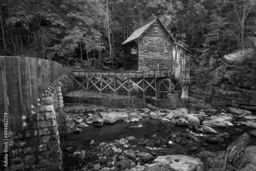 Grayscale shot of a wooden cabin in Babcock State Park photo