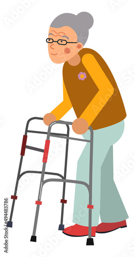 Old woman walking with walker. Senior mobility aid