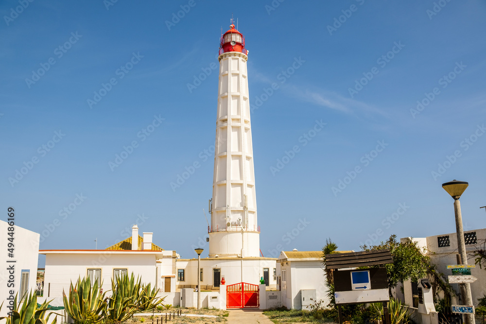 Lighthouse at Farol Island, Faro Disctrict, Algarve, Portugal Lighthouse at Farol Island, Faro Disctrict, Algarve, Portugal