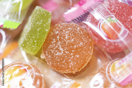 Closeup shot of colorful sour fruit candies photo