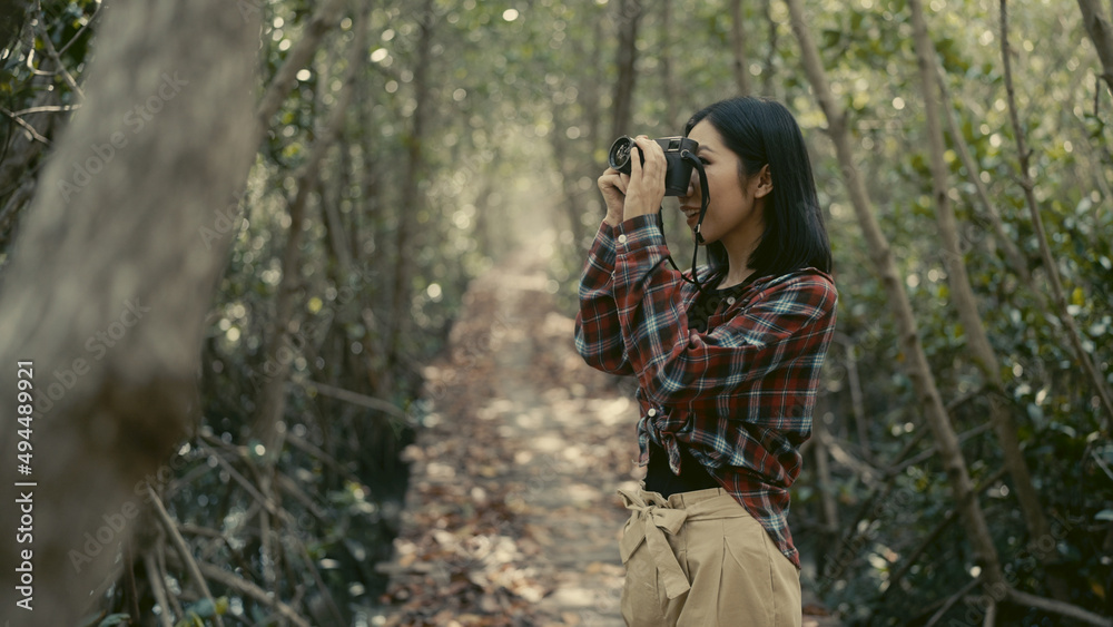Asian women traveling in tropical forests