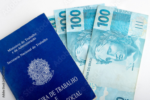 brazilian work card with brazilian money, economy and labor market, photo
