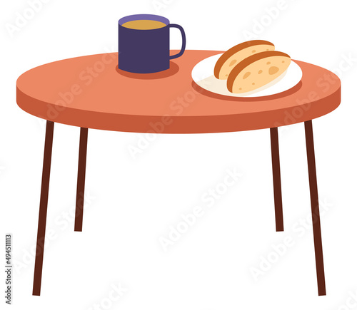 Coffee cup and bread slice plate on wooden table