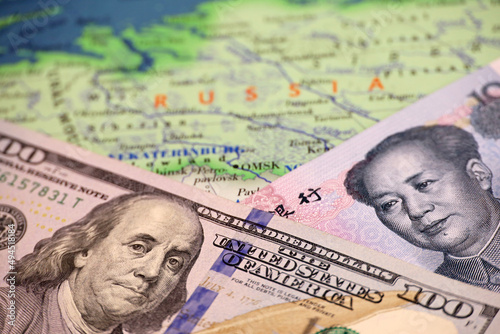 Wallpaper Mural US dollar and Chinese yuan on the map of Russia. Concept of economic cooperation between the Beijing and Moscow during american sanctions due conflict in Ukraine Torontodigital.ca