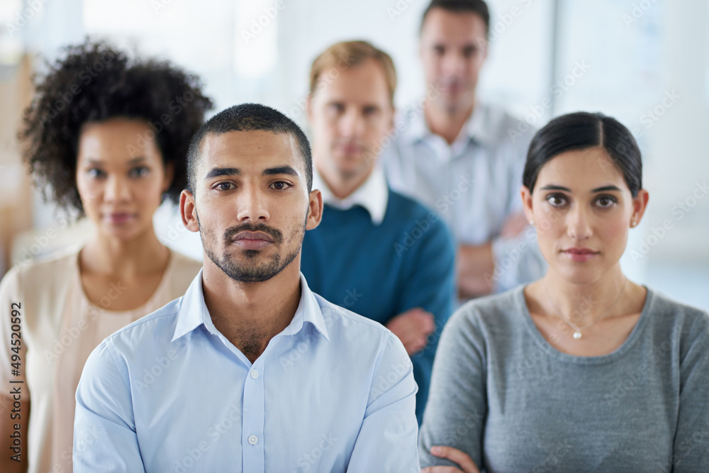 Success or nothing at all. Portrait of a group of diverse colleagues standing in an office. Success or nothing at all. Portrait of a group of diverse colleagues standing in an office.