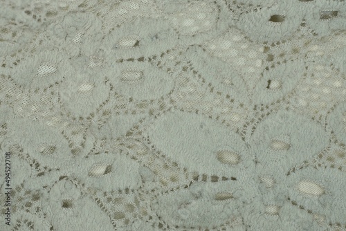 gray white texture of woolen fabric with a pattern