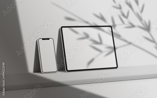 Realistic tablet screen mockup with shadow on top of devices.