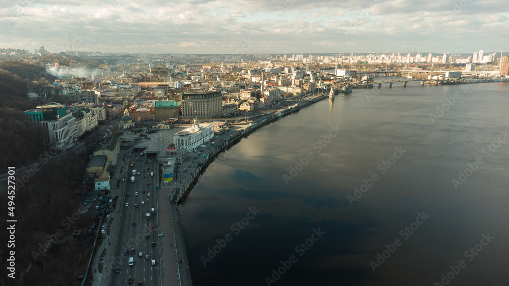 Scenic top panoramic view of Kyiv city Podol old center, Dnepr river Rybalskiy island panoramic landscape. Ukrainian capital Kiev blizzard panorama