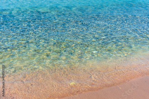 Fototapeta Naklejka Na Ścianę i Meble -  Beautiful pink sand and crystal clear water in Pescoluse Beach, Salento, Apulia Italy