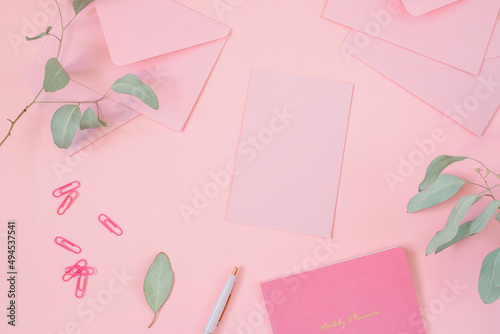Blank branding paper card with mockup copy space on pastel pink background.
