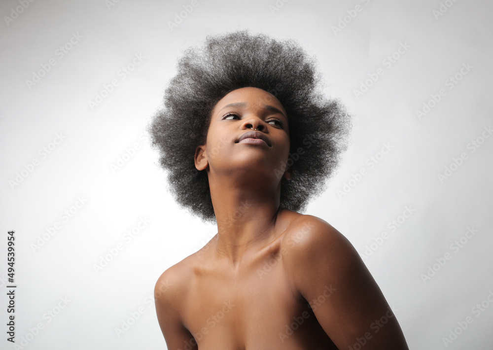 portrait of young black woman on gray background portrait of young black woman on gray background