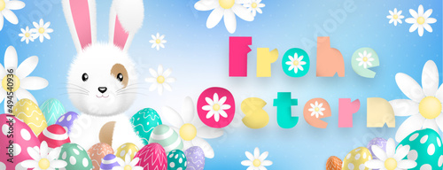 German text with sweet colors : Frohe Ostern, with a cute white rabbit behind colored eggs and flowers on a blue background