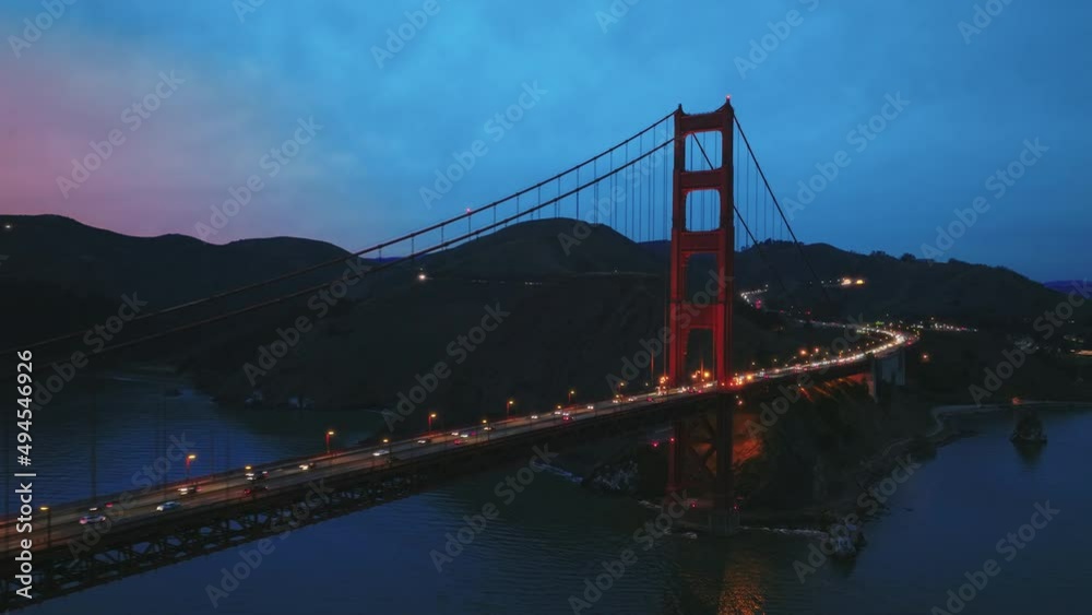 4K aerial night city illumination, Golden Gate Bay Bridge at night time USA