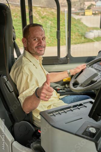 man working in to the city bus driving