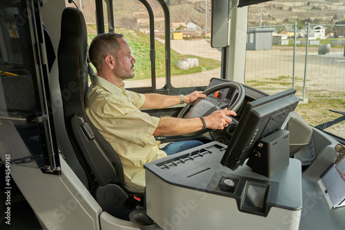 man working in to the city bus driving