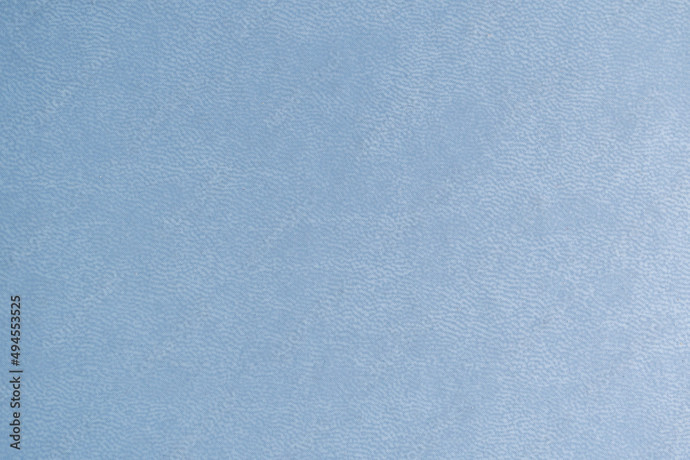 detalle de textura de cubierta de portada de agenda polipiel azul con detalles de impresión dorada - obrazy, fototapety, plakaty 
