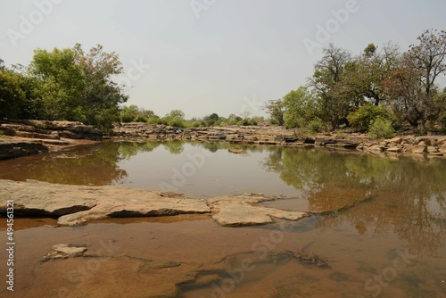 tamda river stream through the wilderness photo