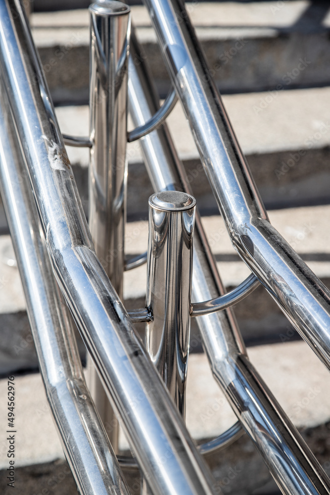 Outdoor Concrete Staircase With Stainless Steel Handrail. Outdoor Concrete Staircase With Stainless Steel Handrail.