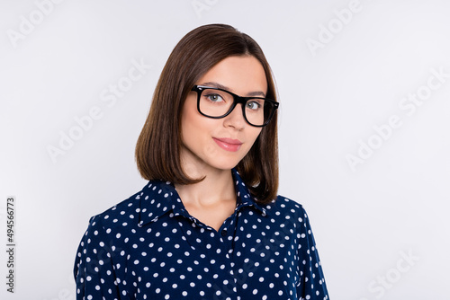 Photo of young adorable woman confident clever representative employer isolated over grey color background